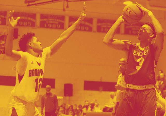 An FDA basketball player shooting during a game.