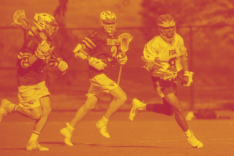 A Harlem Lacrosse player in an FDA uniform during a match.